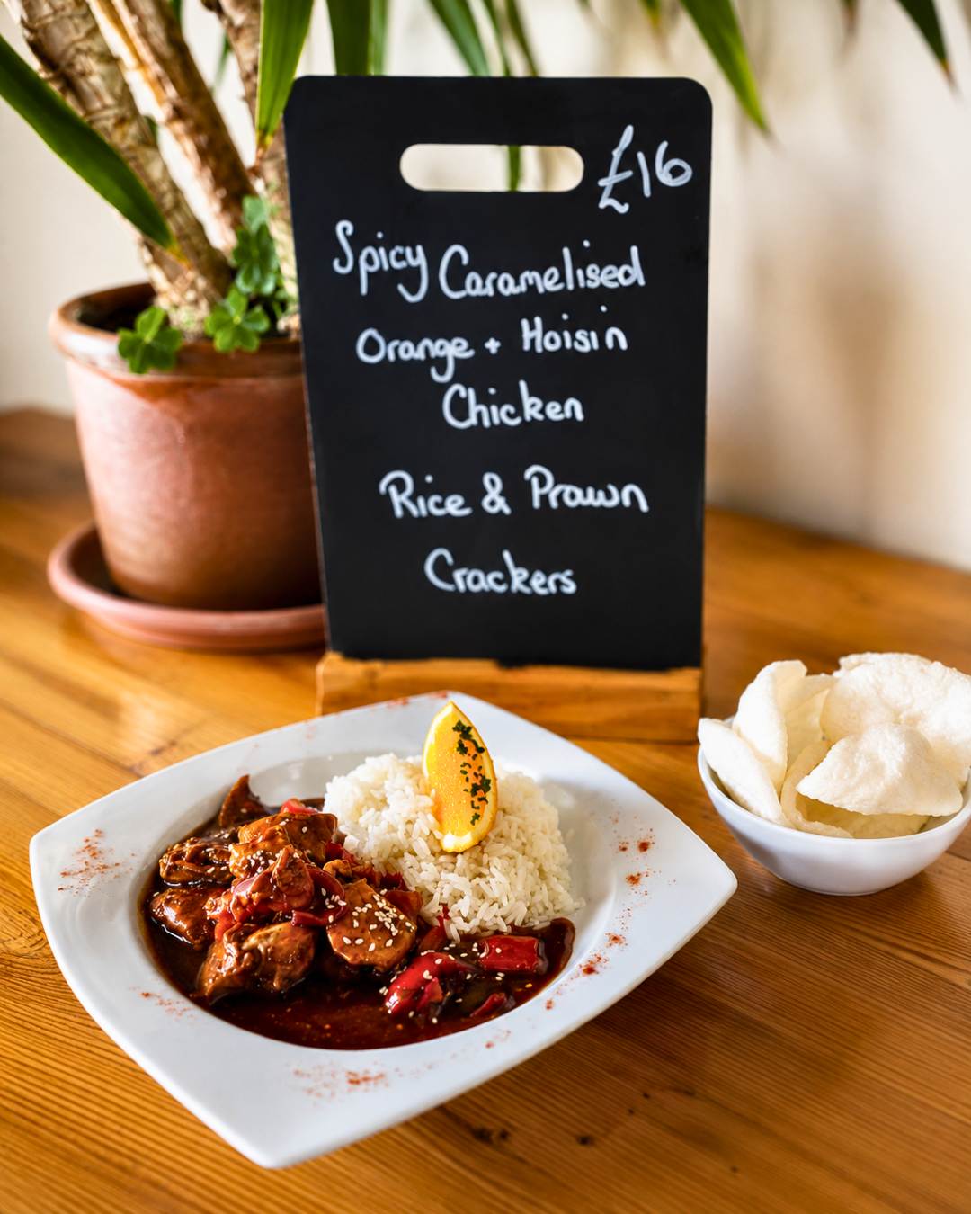 Spicy Caramelised Orange and Hoisin Chicken served with rice and prawn crackers